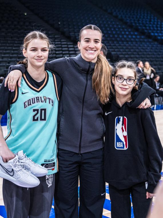 Group picture on the game floor before the game