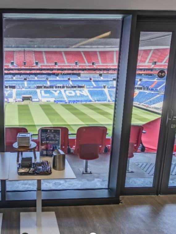 Inside the Silver Box at the stadium, offering a panoramic view of the field for an exclusive experience