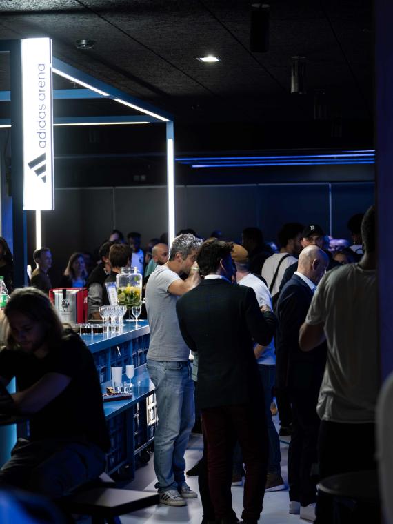 Paris Basketball hospitality offering with a bar and drinks at the Adidas Arena, providing a premium experience for fans